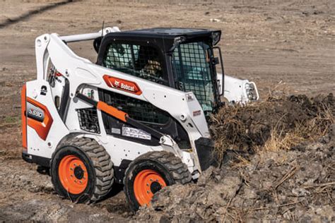 how much dirt can a skid steer dig an hour|how much dirt can a bobcat move.